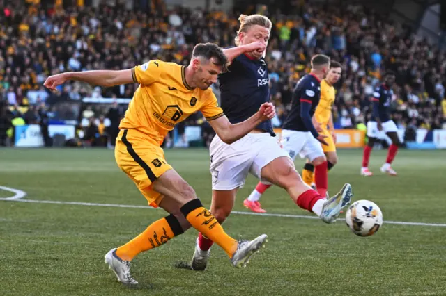 Livingston's Ryan McGowan and Ross County's Alex Samuel
