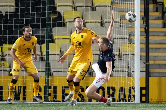 Jordan White goes down after a tug from Danny Wilson