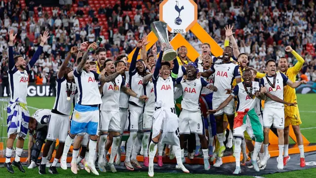 Tottenham players with the trophy