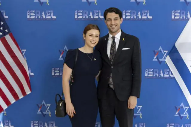 Sarah Milgrim and Yaron Lischinsky pose for a photo