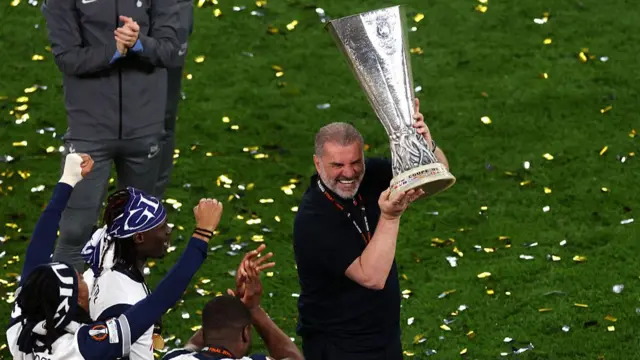 Postecoglou with the Europa League trophy