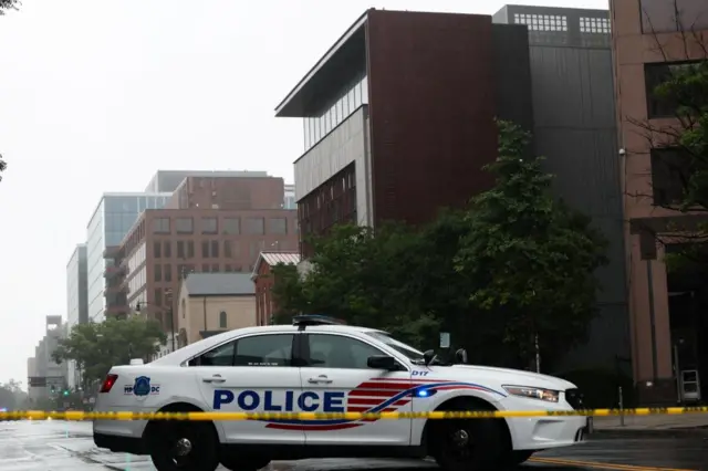 A police car parked outside the Capital Jewish Museum