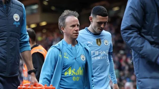 Manchester City's Phil Foden goes off injured away to Manchester United