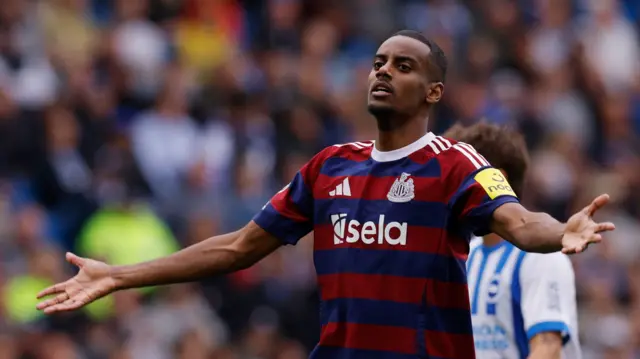 Alexander Isak celebrates scoring for Newcastle against Brighton