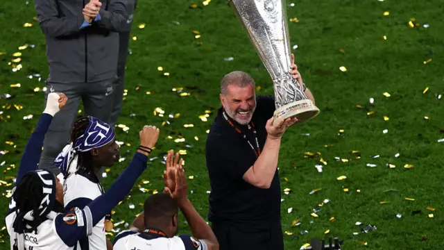 Ange Postecoglou with Europa League trophy