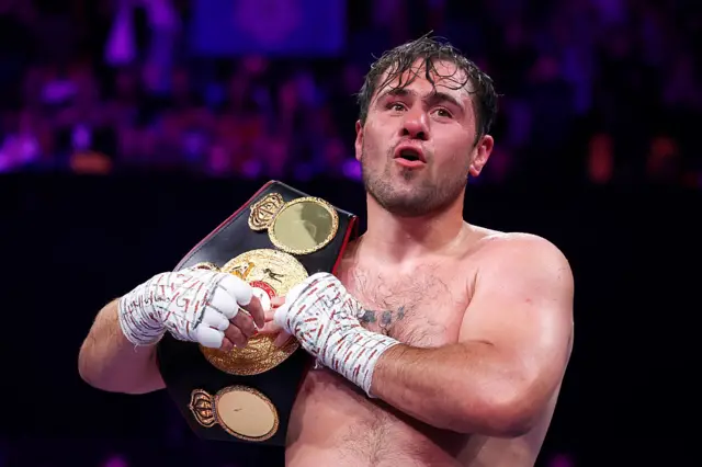 David Allen holding a boxing championship