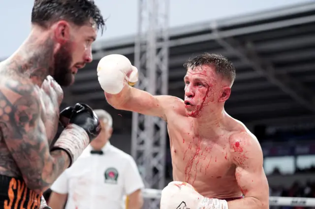 Reece Mould throws an overhand at Lewis Sylvester