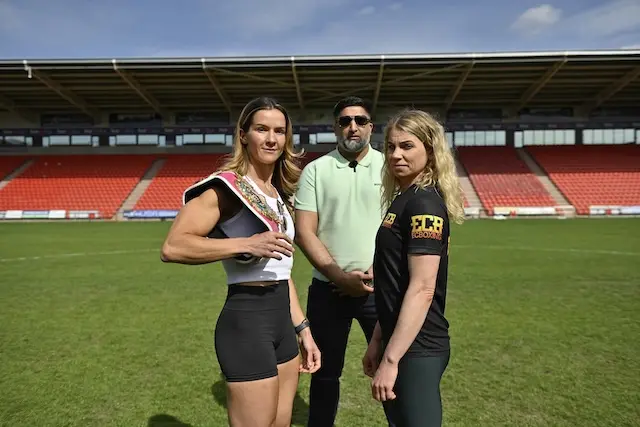 Terri Harper and Natalie Zimmermann on the pitch in Doncaster