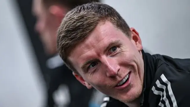 Matt Targett smiles