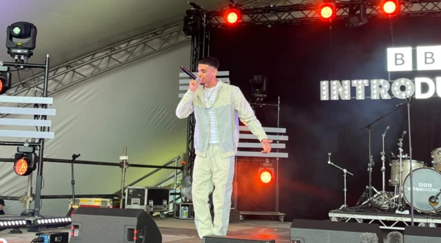 Billy Khan on stage.