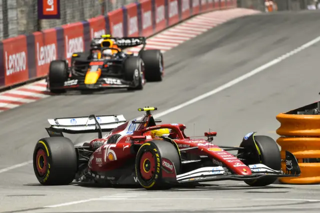 Lewis Hamilton's Ferrari ahead of a Red Bull during Monaco Grand Prix practice