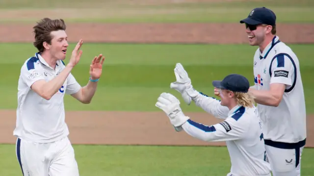 George Hill takes a wicket