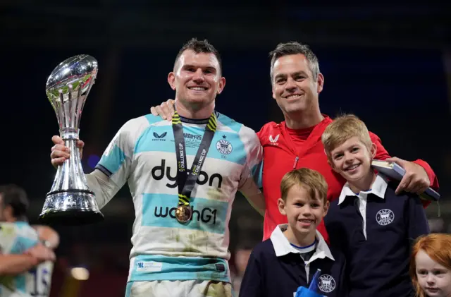 Bath's Ben Spencer and Bath director of rugby Johann van Graan celebrate with the trophy after the EPCR Challenge Cup Final