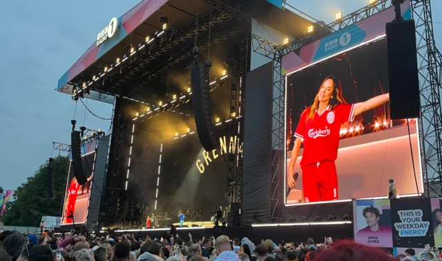Mel C in red football kit.