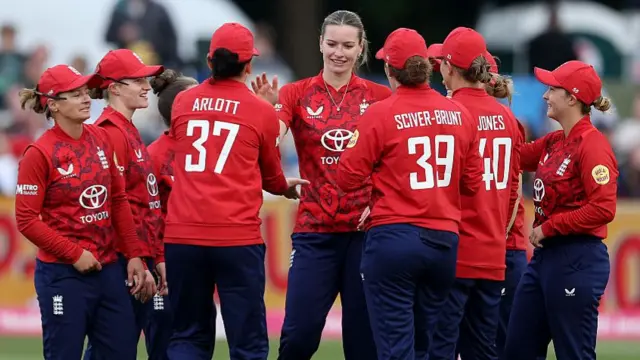 Lauren Bell of England celebrates taking the wicket of Zaida James of West Indies