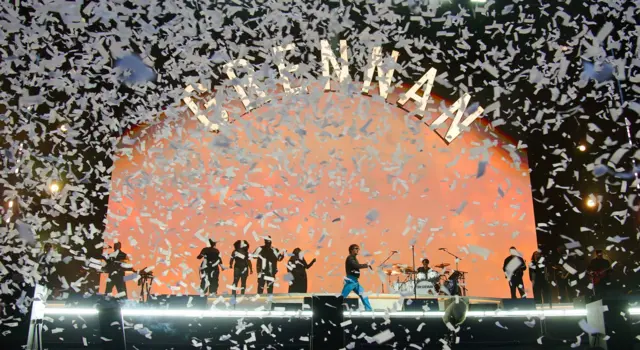 Confetti rains down on the stage as Tom Grennan performs