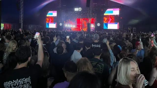 Confidence Man on stage view from the crowd