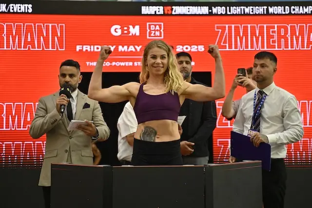 Natalie Zimmermann flexing her biceps