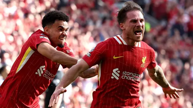 Alexis Mac Allister celebrates scoring for Liverpool against Tottenham