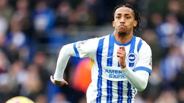Joao Pedro running after the ball while playing for Brighton
