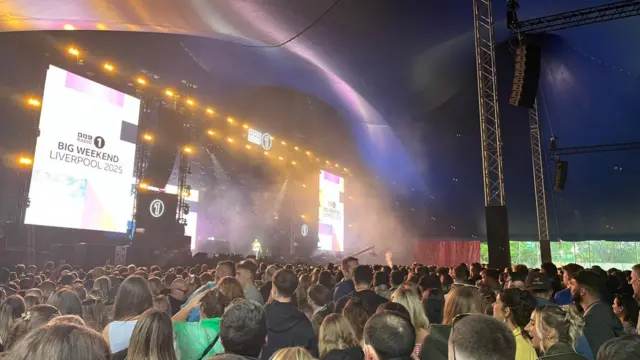 A large crowd stands in front of the New Music Stage at Big Weekend waiting for Aitch and AJ Tracey to perform.