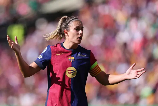 Putellas waves her arms in frustration
