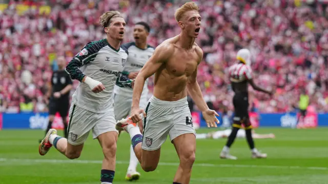 Tommy Watson celebrates scoring
