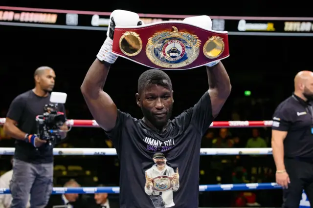 Essuman lifts his title
