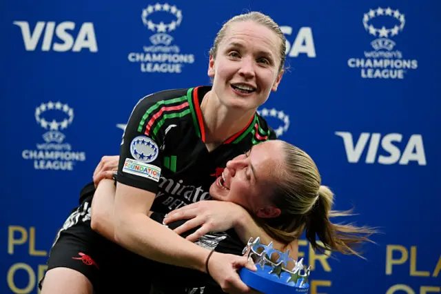 Kim Little of Arsenal celebrates with team mate Beth Mead