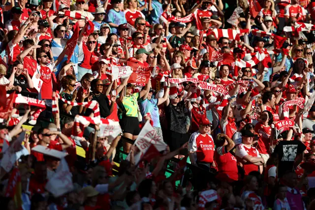 Fans of Arsenal look on from the stands