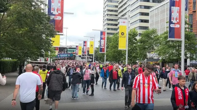 Fans mingling on Wembley Way ahead of the play-off final.
