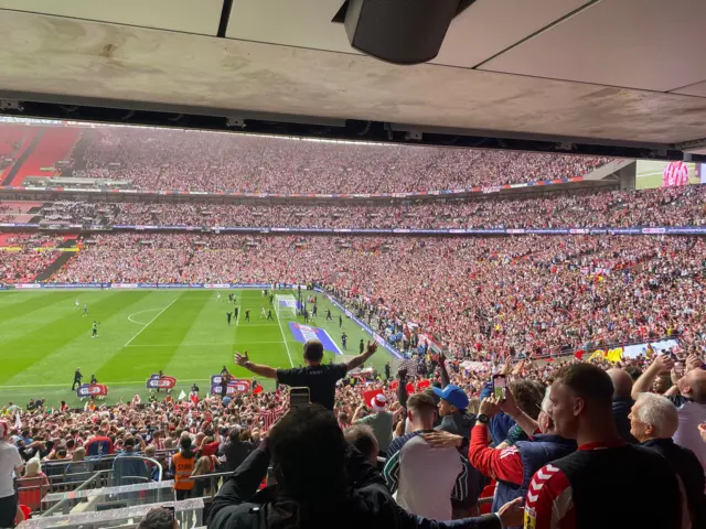 Sunderland fans celebrate at the full-time whistle