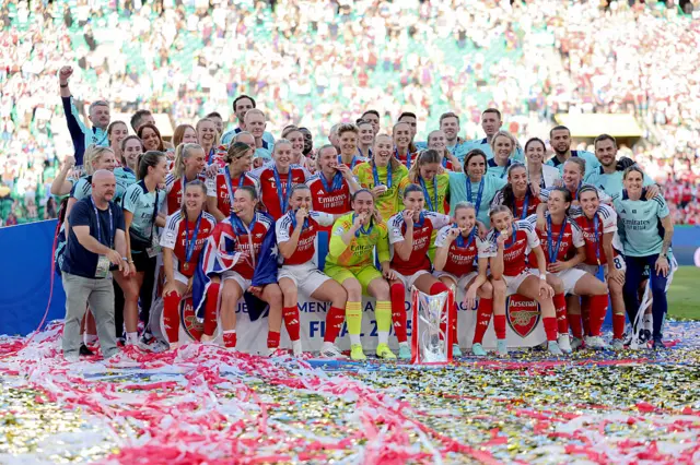Arsenal with the Champions League trophy