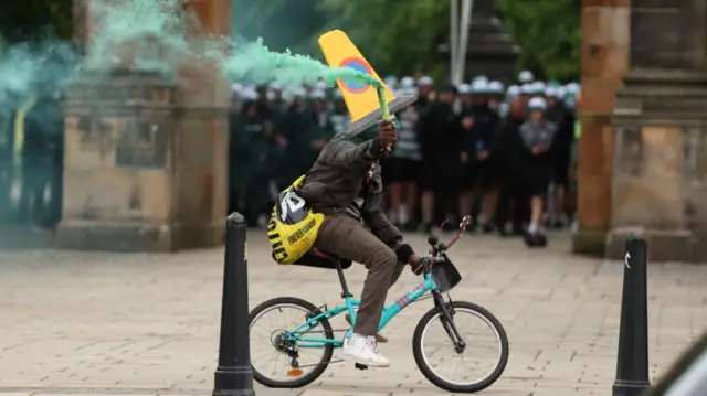 Celtic fan on bike