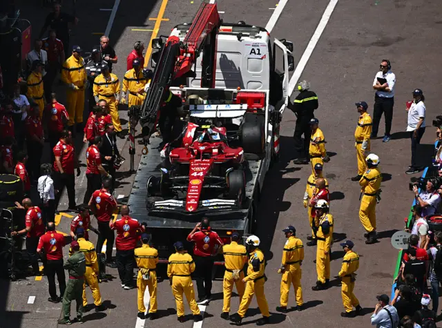 Lewis Hamilton's car on the recovery truck