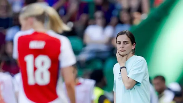 Renee Slegers watches on from the touchline