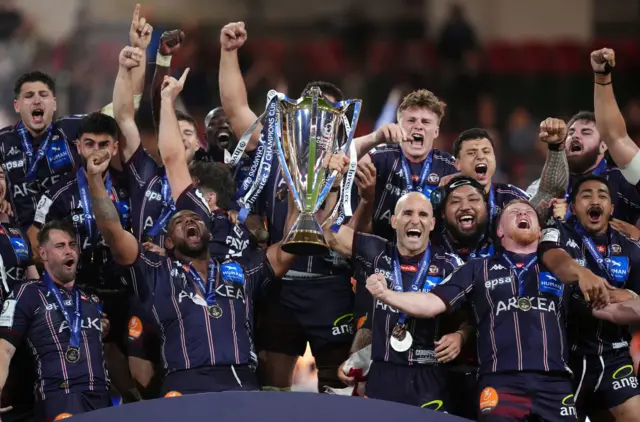 Jefferson Poirot and Maxime Lucu lift Champions Cup trophy