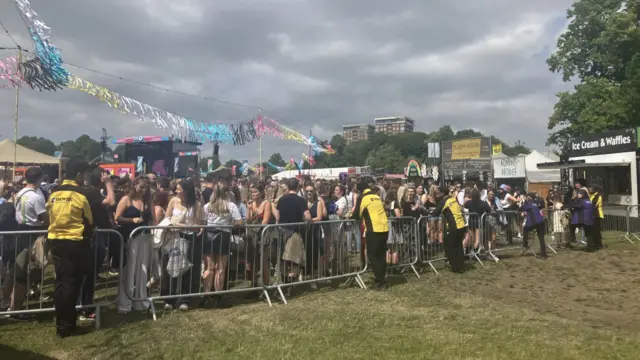 Fans queue behind barriers at BBC Radio 1's Big Weekend in Liverpool