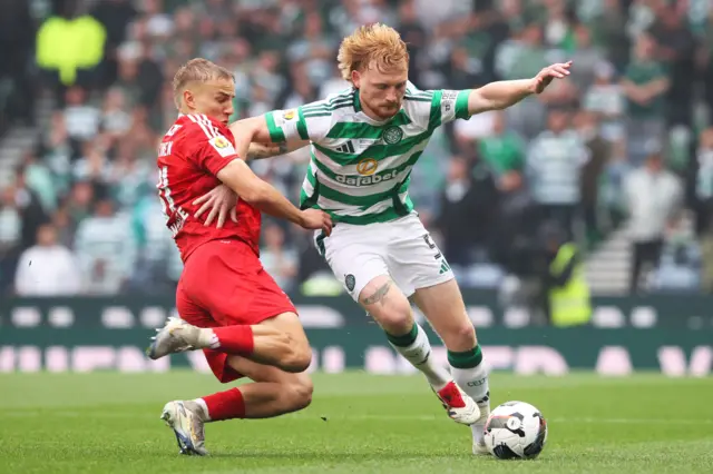Aberdeen's Topi Keskinen and Celtic's Liam Scales