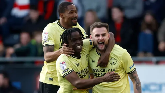 Charlton celebrating scoring late at Leyton Orient this season