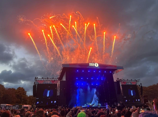 Fireworks above big stage.