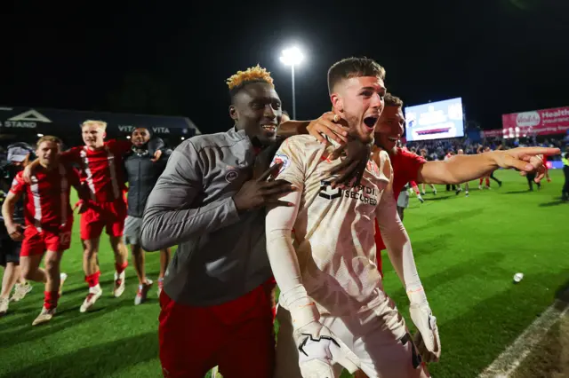 Josh Keeley of Leyton Orient celebrates with the travelling supporters