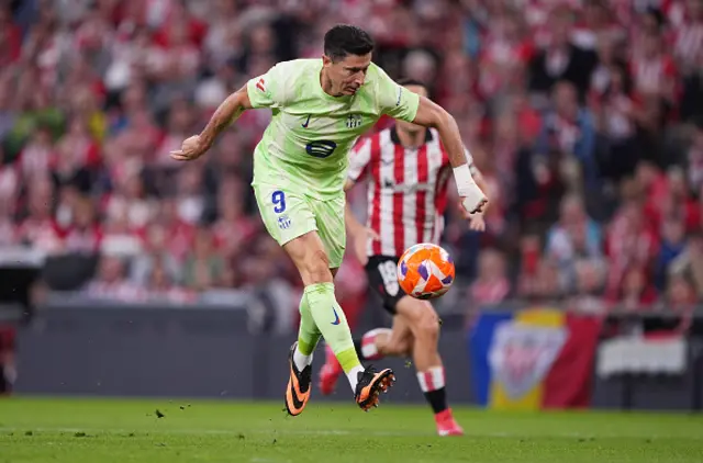 Robert Lewandowski of FC Barcelona scores