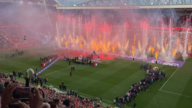 Fans film the fireworks