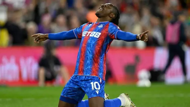 Eze celebrating