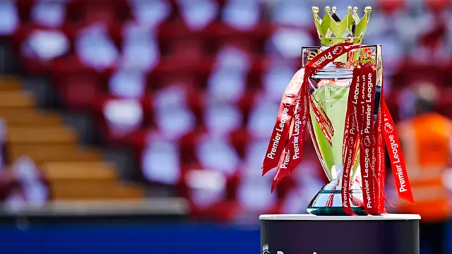 The league trophy on display before the Premier League match at Anfield, Liverpool.