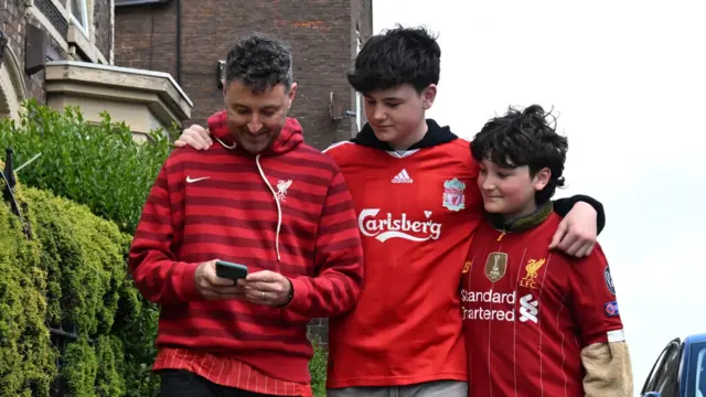 Liverpool fans before the Premier League match at Anfield, Liverpool.