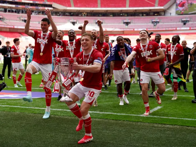 Charlton Athletic's Greg Docherty celebrates in front of his fans