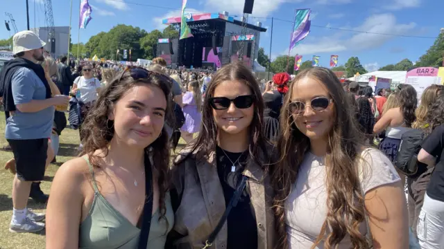 Grace, Kara and Lauren pose and smile at the camera