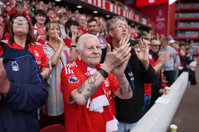 A fan of Nottingham Forest applauds prior to the Premier League match between Nottingham Forest FC and Chelsea FC at City Ground on May 25, 2025 in Nottingham, England.